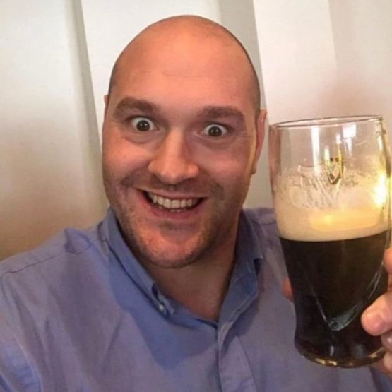 Tyson Fury with a pint of guinness