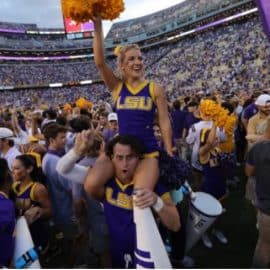 lsu cheerleader field storm.webp