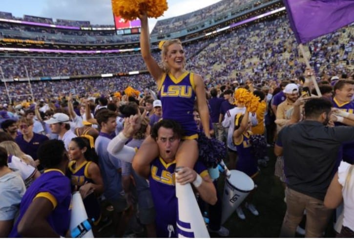 lsu cheerleader field storm.webp