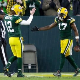 Aaron Rodgers celebrates touchdown with Davante Adams.
