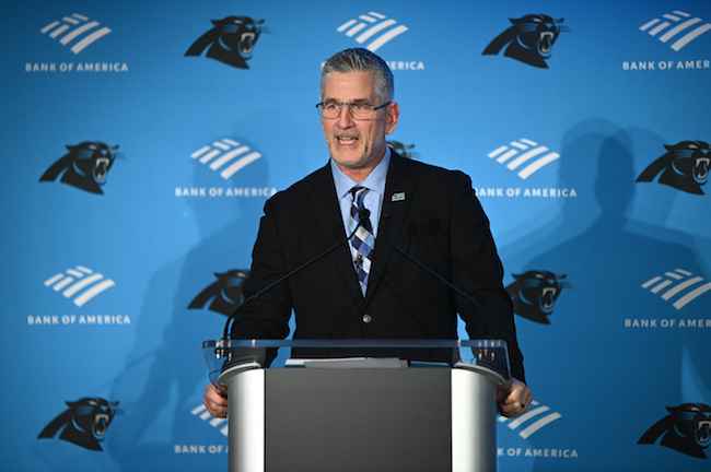 Frank Reich stands out the podium in Carolina.