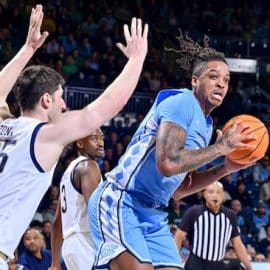 Armando Bacot of North Carolina holds the ball.