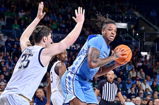 Armando Bacot of North Carolina holds the ball.