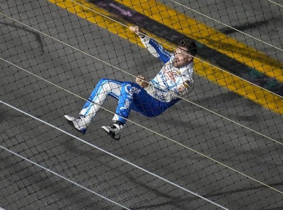 ricky stenhouse climb fence sTRIB (1)