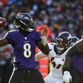 Baltimore Ravens quarterback Lamar Jackson throws a pass.