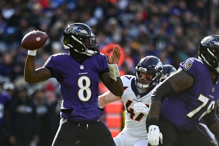 Baltimore Ravens quarterback Lamar Jackson throws a pass.