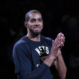 Brooklyn Nets center LaMarcus Aldridge claps.