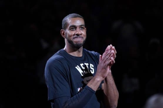 Brooklyn Nets center LaMarcus Aldridge claps.