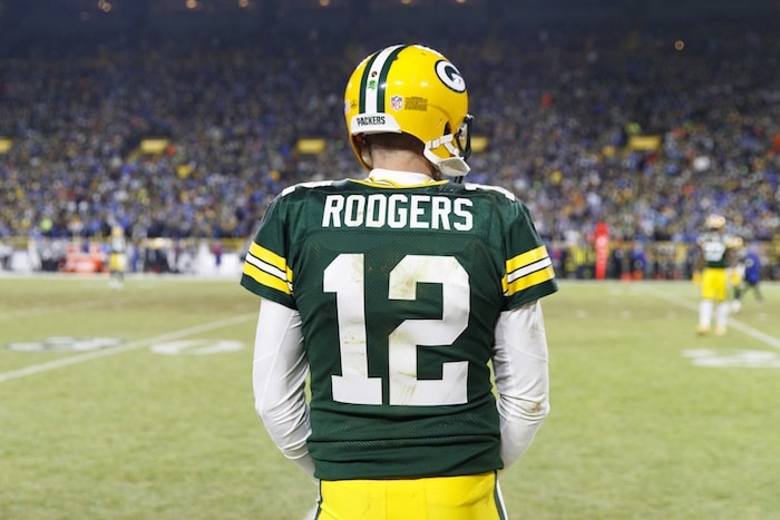 Green Bay Packers quarterback Aaron Rodgers stands.
