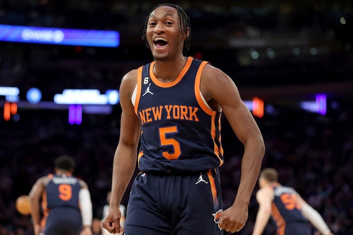 New York Knicks guard Immanuel Quickley flexes.