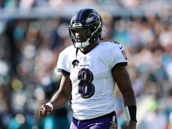 Baltimore Ravens quarterback Lamar Jackson walks off the field.