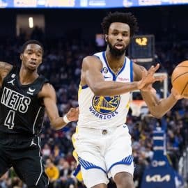Golden State Warriors forward Andrew Wiggins passes the ball.