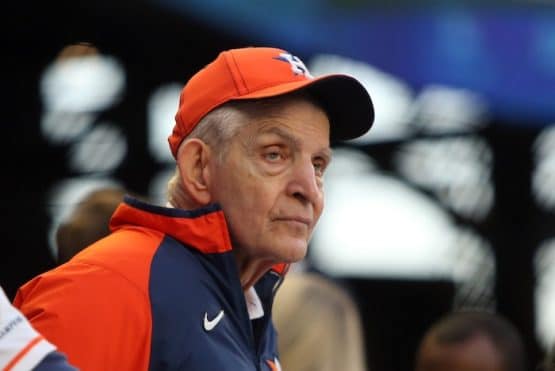 Mattress Mack looks and stares.