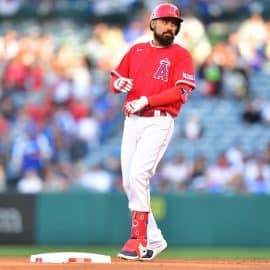 Los Angeles Angels third baseman Anthony Rendon stands on a base.