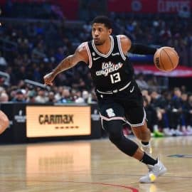 Los Angeles Clippers forward Paul George dribbles the ball.