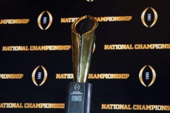 A picture of The College Football Playoff National Championship trophy.