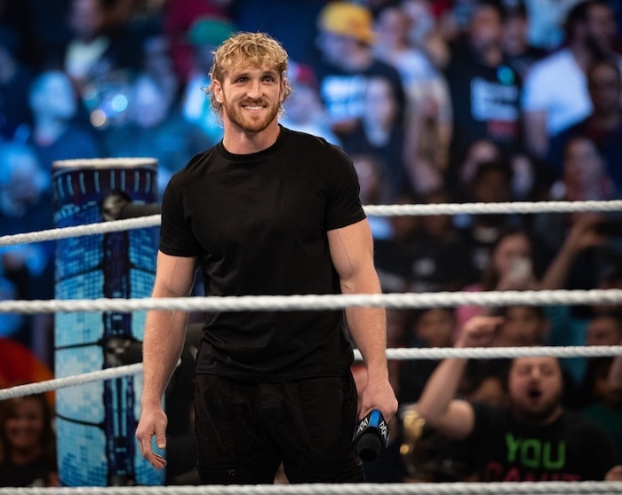 YouTube star turned WWE wrestler Logan Paul stands in the rin.
