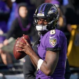 Baltimore Ravens quarterback Lamar Jackson throws the ball.