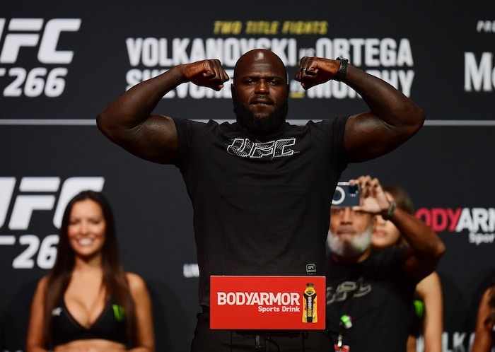 Jairzinho Rozenstruik stands at UFC weigh-in.