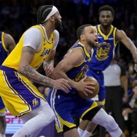 Los Angeles Lakers forward Anthony Davis (3) blocks a shot by Golden State Warriors guard Stephen Curry