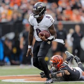 Baltimore Ravens quarterback Lamar Jackson (8) runs with the ball