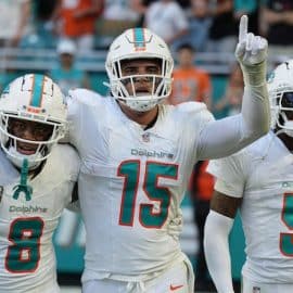 Miami Dolphins linebacker Jaelan Phillips (15) celebrates an interception during the second half of an NFL game