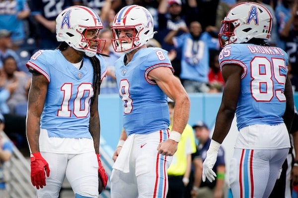 Tennessee Titans quarterback Will Levis (8) reacts after wide receiver DeAndre Hopkins (10) received a pass