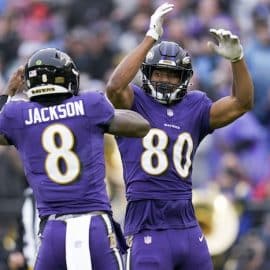 Baltimore Ravens tight end Isaiah Likely (80) celebrates a touchdown with quarterback Lamar Jackson (8)