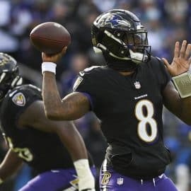 Baltimore Ravens quarterback Lamar Jackson (8) throws during the