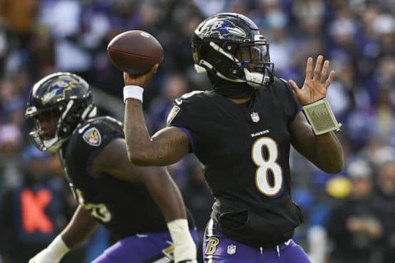 Baltimore Ravens quarterback Lamar Jackson (8) throws during the