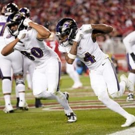 Baltimore Ravens wide receiver Zay Flowers (4) celebrates with end Isaiah Likely