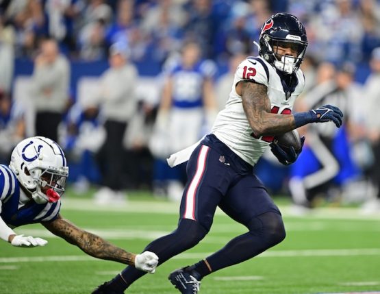Houston Texans wide receiver Nico Collins (12) catches a long pass