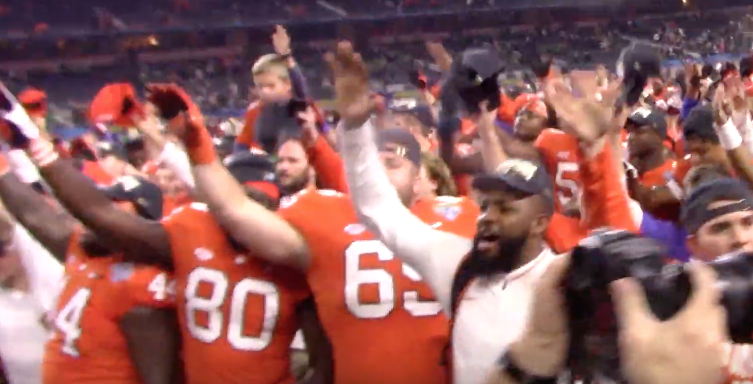 Clemson players celebrate Cotton Bowl win on field with fans after game
